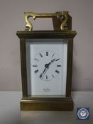 A brass carriage clock signed St.