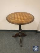 A Victorian mahogany games topped table,