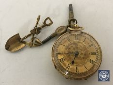 An 18ct gold fob watch with keys and a 9ct gold brooch