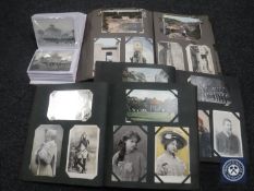 Four good large albums containing antique and later postcards