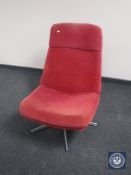A late 20th century swivel armchair on chrome base upholstered in a red corded fabric