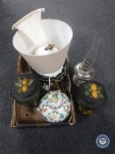 A box of wooden storage jars, chrome oil lamp with chimney etc.