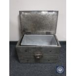 A metal bound coal box with lion mask decoration and liner