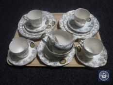 A tray containing eighteen pieces of Women's Institute tea china