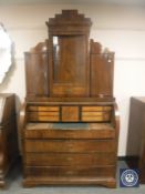 A continental mahogany cylinder bureau bookcase,