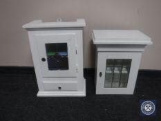Two painted wall cabinets with leaded glass doors