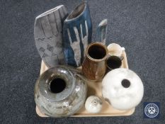 A tray of studio pottery vases and bowls, tea cup and mug,