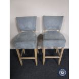 A pair of bar chairs