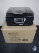 A boxed Neostar CD recorder with turntable