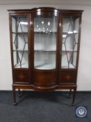 A late Victorian inlaid mahogany bowfront double door display cabinet CONDITION REPORT: