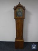 A walnut cased Tempus Fugit granddaughter clock with brass dial,