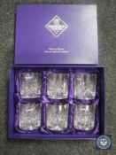 A boxed set of six Edinburgh Crystal whisky glasses