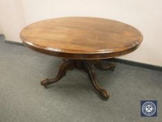A Victorian rosewood oval tilt top breakfast table,