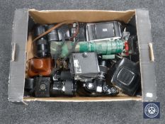 A box containing assorted cameras and lens - Zenit, Kodak Brownie,