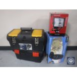 Two plastic toolboxes containing hand tools together with a security light and a massager