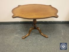 A traditional style shaped occasional table,