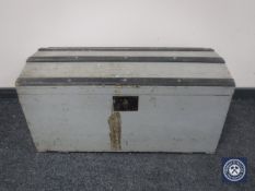 An early 20th century painted pine domed topped trunk