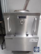 A stainless steel commercial tandoori oven with metal skewers CONDITION REPORT: