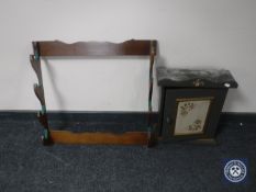 A hand painted wall cabinet and a gun rack