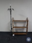 A pine plate rack together with a wrought iron standard lamp