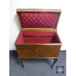 A mahogany sewing box on Queen Anne style legs