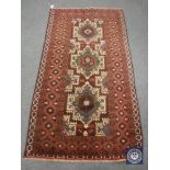 A Baluchi rug 190 cm x 102 cm