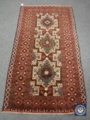 A Baluchi rug 190 cm x 102 cm