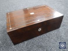 A Victorian rosewood writing box inset with mother of pearl