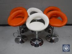 Six leather upholstered gas lift bar stools (two white,