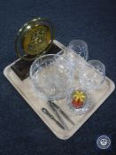 A brass embossed dinner gong and beater on stand, assorted glass ware, brandy glasses,
