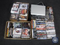 Four boxes of assorted DVD's and CD's together with two DVD players