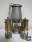 A chrome and brass Wolfe Type E miner's lamp by Morris Limited of Sheffield and two further