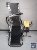 A Pro Fitness treadmill and a Gold Gym ab trainer and shaper