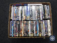 A crate containing a large quantity of DVD's, blockbuster movies, sc-fi, etc.
