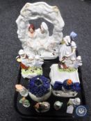 A tray of Staffordshire figures and houses, continental figures,