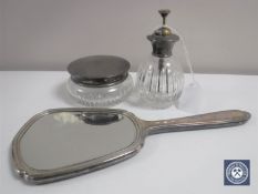 A silver backed hand mirror,