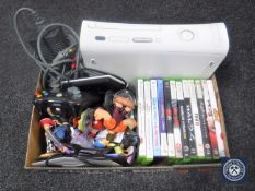 An Xbox 360 with leads,