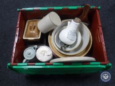 A box of vintage kitchenalia including mixing bowls, chopping boards, utensils,