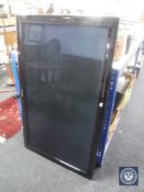 A Samsung 50" plasma TV with remote