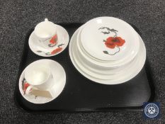 A Wedgwood Susie Cooper designed Corn Poppy two person setting (14 pieces)