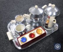 A mid 20th century Everhot tea service on tray and a set of miniature metal ash trays