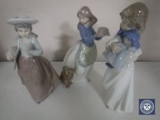 Three Nao figures of girls