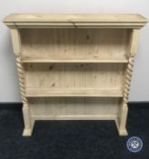 A pine dresser top with barley twist column supports