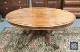 A Victorian rosewood oval tilt top breakfast table,