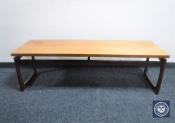 A rectangular teak coffee table