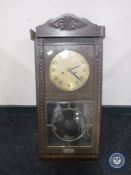 An early 20th century Gensa oak cased wall clock