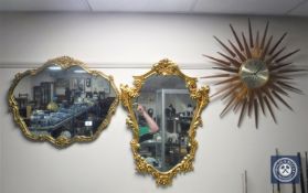 Two ornate gilt framed mirrors and sunburst battery operated clock CONDITION REPORT: