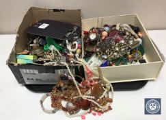 Two boxes of assorted costume jewellery and wristwatches
