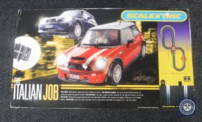 A boxed Scalextric Italian Job racing car set