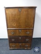 A 19th century oak secretaire chest